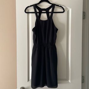 Black dress can be dressed up with belt or dressed down